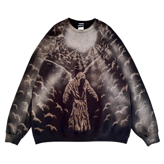 A custom bleached art crewneck sweatshirt featuring a dark, gothic graphic print of a hooded angel with wings and a halo surrounded by numerous bats in a smoky, dark sky. The sweatshirt has a faded, washed-out effect across the sleeves and body, fading from dark gray to black.